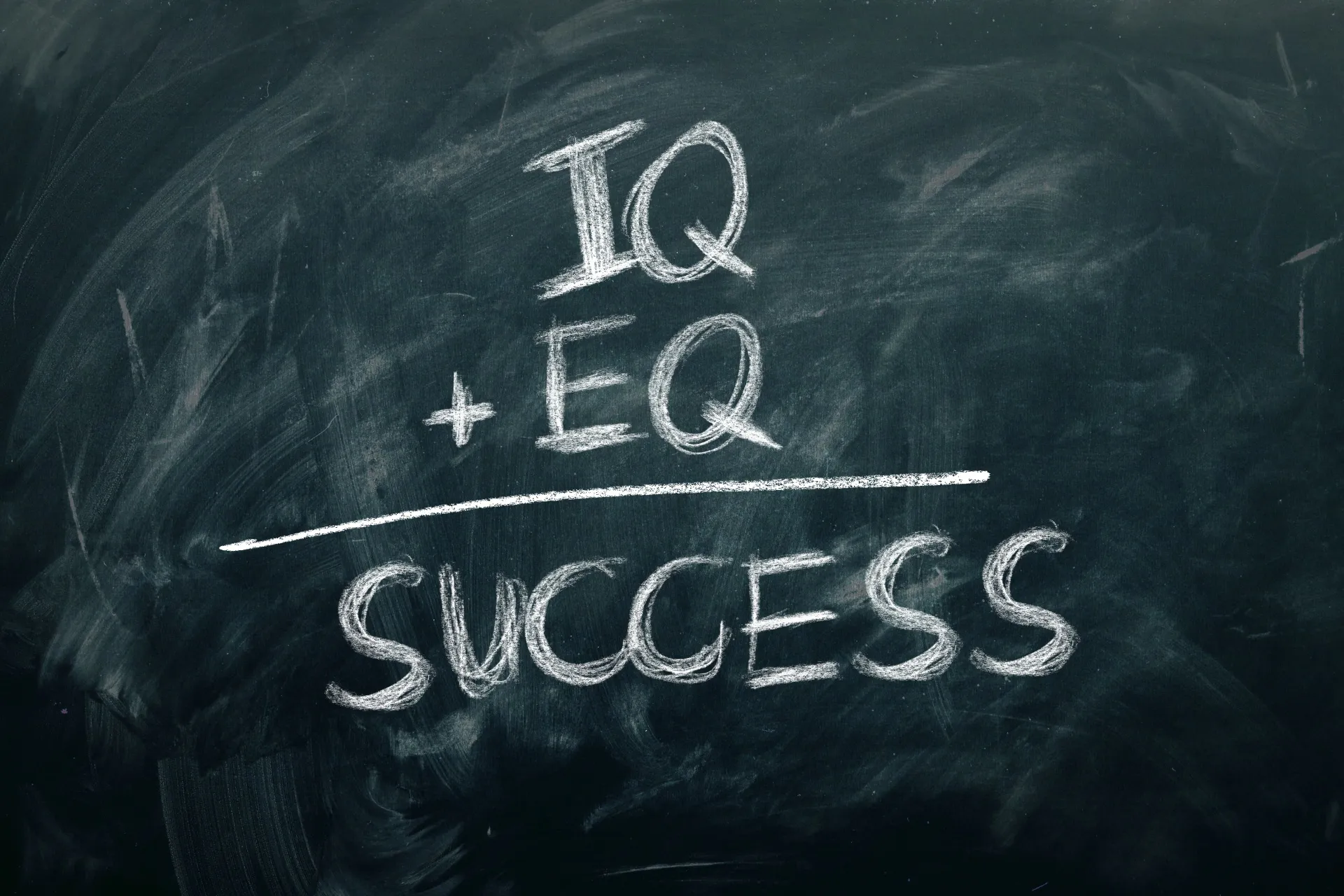 eq+iq=success written on a chalk board
